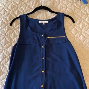 Naked Zebra button up tank with zipper detail.